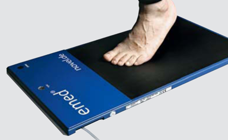 foot standing on emed device
