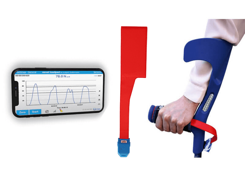 hand on crutch being measured by mobile device