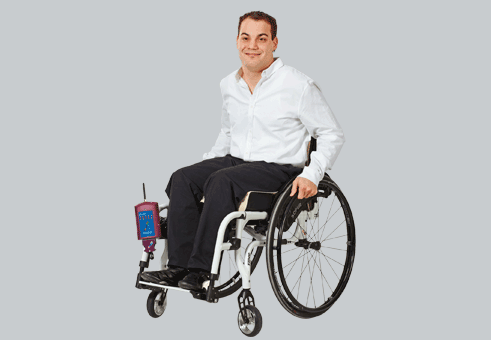 man with sitting in wheelchair with pliance sensor reading pressure data
